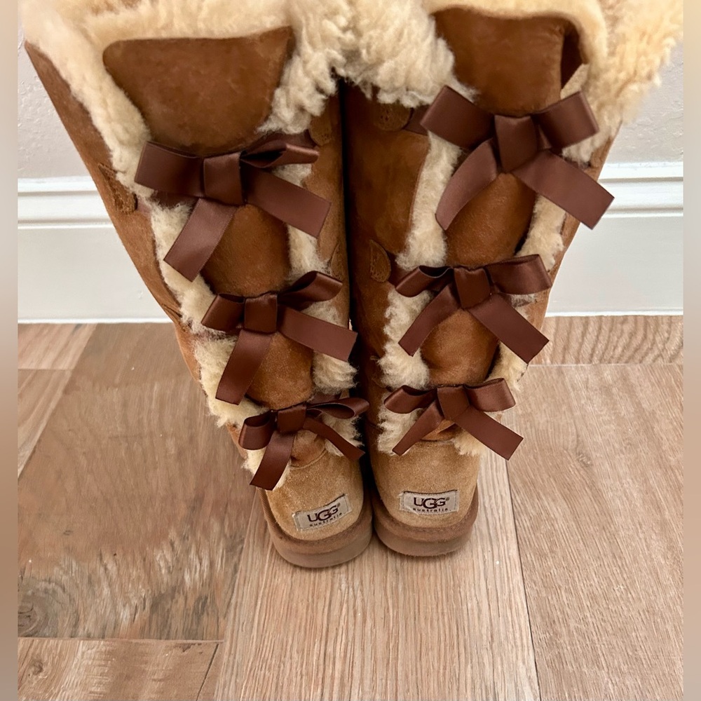 Cozy Brown Winter UGG Women's Bailey Bow Tall II boots in chestnut color. - Picture 3 of 5